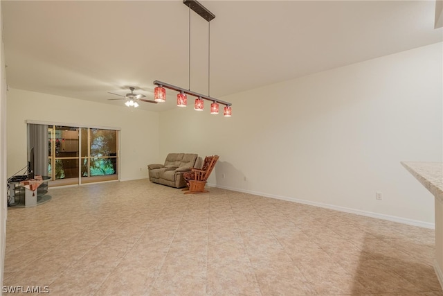 interior space featuring tile flooring and ceiling fan