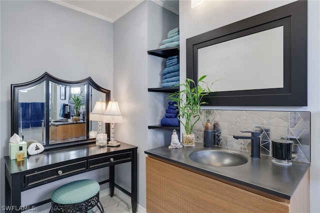 office area featuring marble finish floor, ornamental molding, and a sink