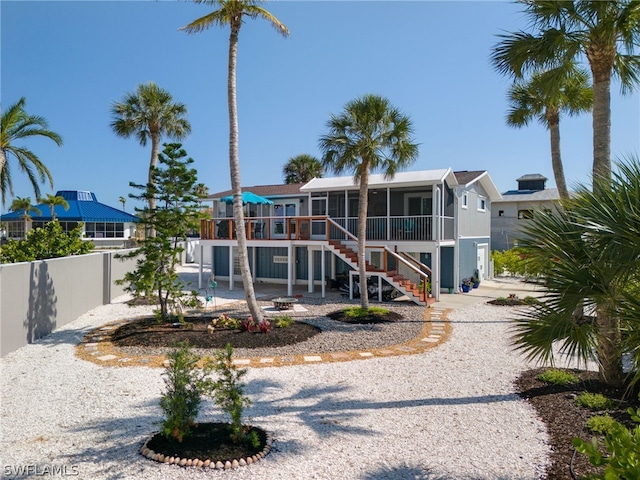 exterior space with stairs and fence