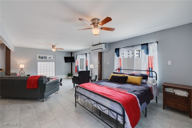 bedroom with a ceiling fan and a wall mounted air conditioner