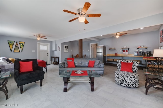 living area with ceiling fan