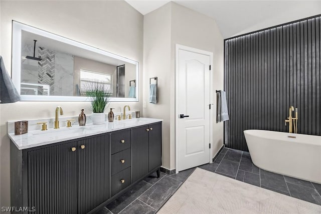 bathroom with vanity, vaulted ceiling, and shower with separate bathtub