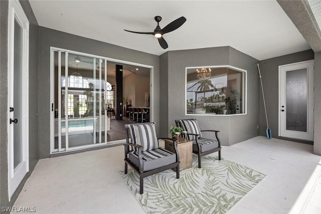 view of patio with ceiling fan