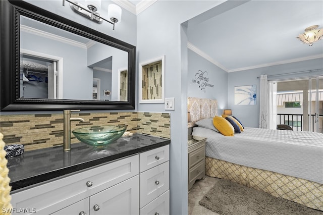 tiled bedroom with sink and ornamental molding