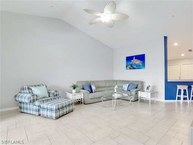 living room with ceiling fan, light tile patterned flooring, and vaulted ceiling