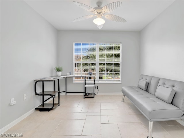 tiled office space with ceiling fan