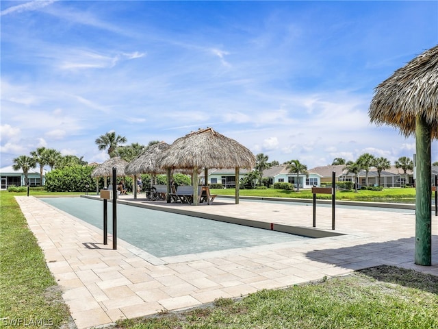 view of swimming pool featuring a gazebo