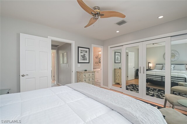 bedroom with french doors and ceiling fan