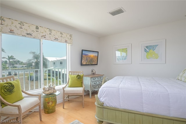 bedroom with light hardwood / wood-style flooring