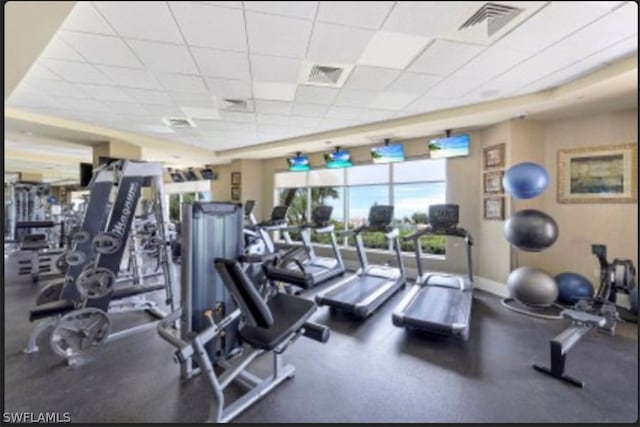 workout area with a drop ceiling