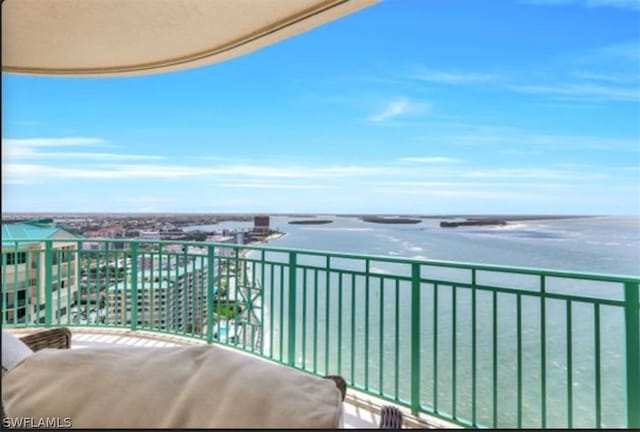 balcony featuring a water view