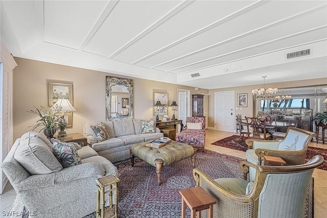 living room featuring a chandelier