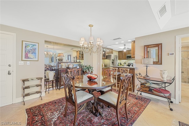 dining area featuring ceiling fan with notable chandelier and light tile floors