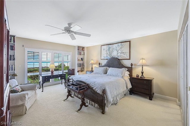 bedroom featuring a closet, ceiling fan, and carpet floors