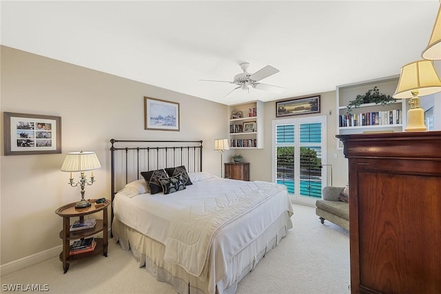 bedroom with ceiling fan, carpet floors, and access to exterior