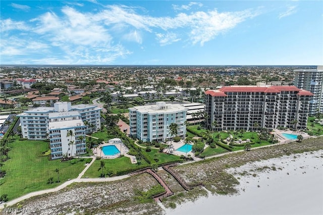 drone / aerial view with a water view