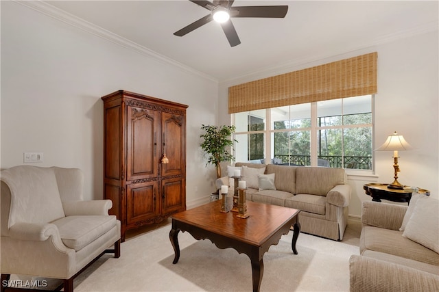 living room with ceiling fan and crown molding