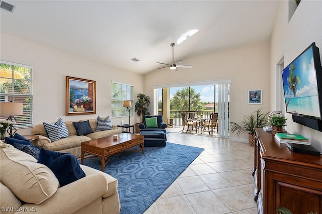 tiled living room with vaulted ceiling and ceiling fan