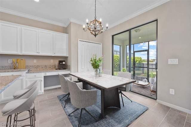 dining area featuring a notable chandelier, crown molding, baseboards, and light tile patterned floors