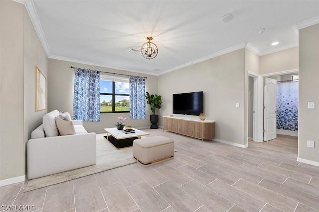 living room with baseboards, ornamental molding, wood finish floors, and a notable chandelier