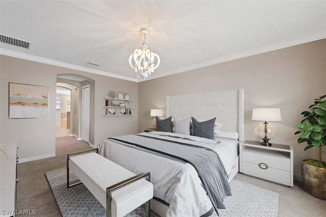 bedroom with visible vents, arched walkways, and ornamental molding