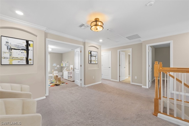 spare room with baseboards, visible vents, and light colored carpet