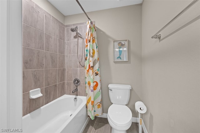 full bathroom with toilet, baseboards, shower / bath combination with curtain, and tile patterned floors