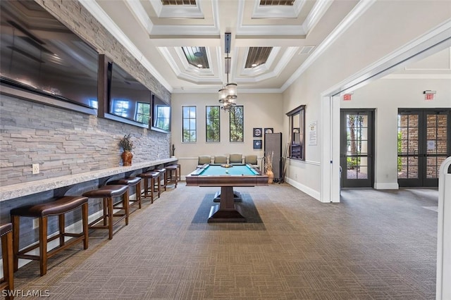 recreation room featuring carpet, visible vents, crown molding, and french doors