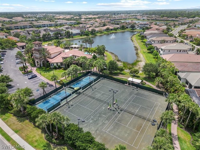 aerial view featuring a water view and a residential view