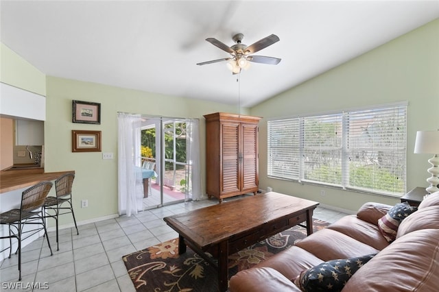 tiled living room featuring lofted ceiling and ceiling fan