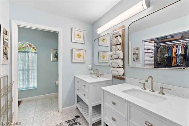 bathroom featuring vanity and tile patterned floors