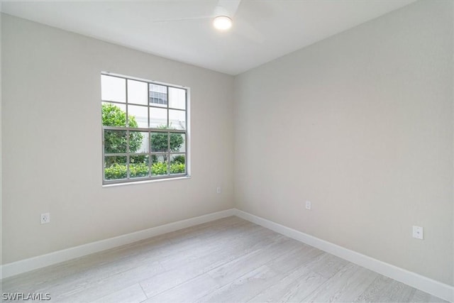 unfurnished room featuring light wood-type flooring