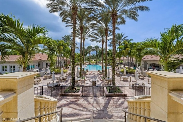 view of home's community featuring a pool