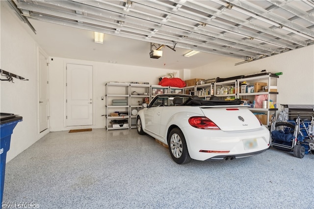 garage featuring a garage door opener