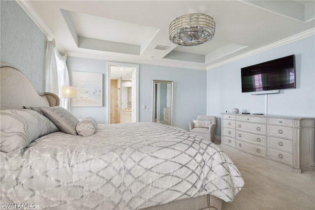 bedroom featuring light carpet, ornamental molding, connected bathroom, and a raised ceiling