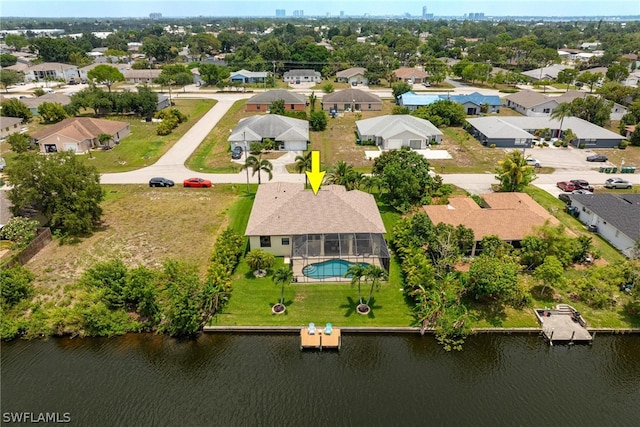 drone / aerial view with a water view