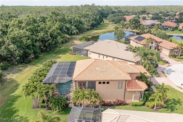 drone / aerial view with a water view