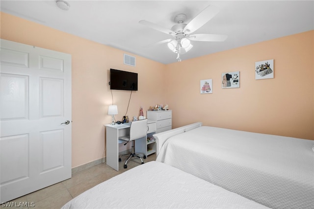 bedroom with tile floors and ceiling fan