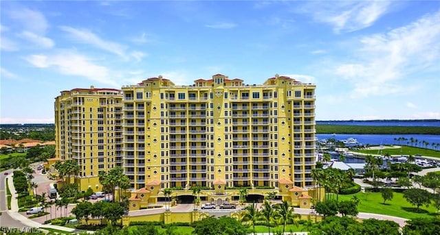 view of building exterior with a water view