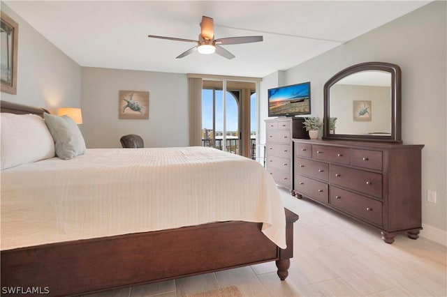 bedroom with access to exterior, light wood-type flooring, and ceiling fan