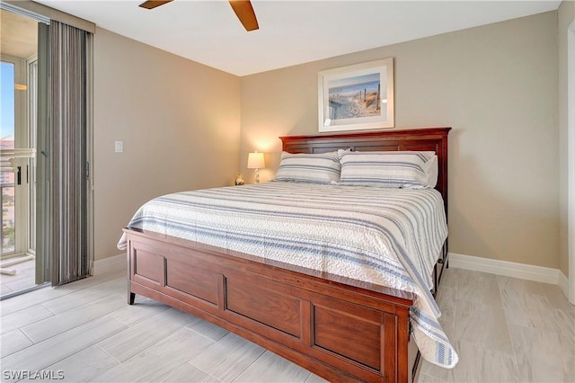 bedroom with baseboards and ceiling fan