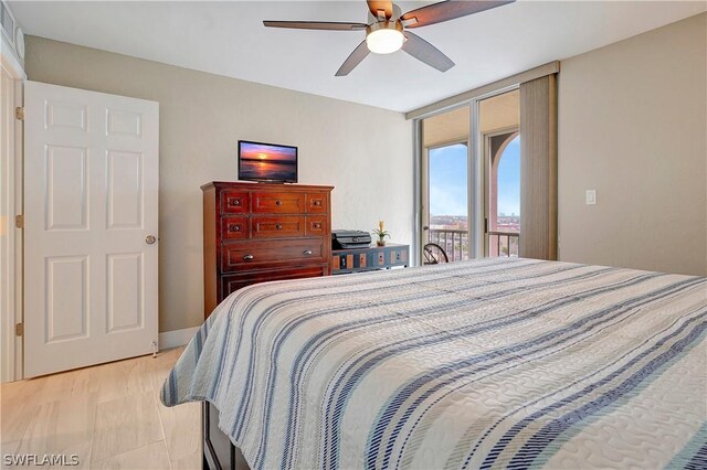 bedroom featuring access to outside, ceiling fan, and light hardwood / wood-style floors