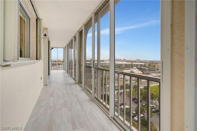 interior space featuring floor to ceiling windows and a wealth of natural light