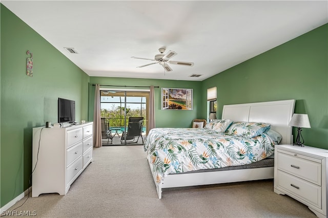 bedroom featuring ceiling fan, access to exterior, and light carpet