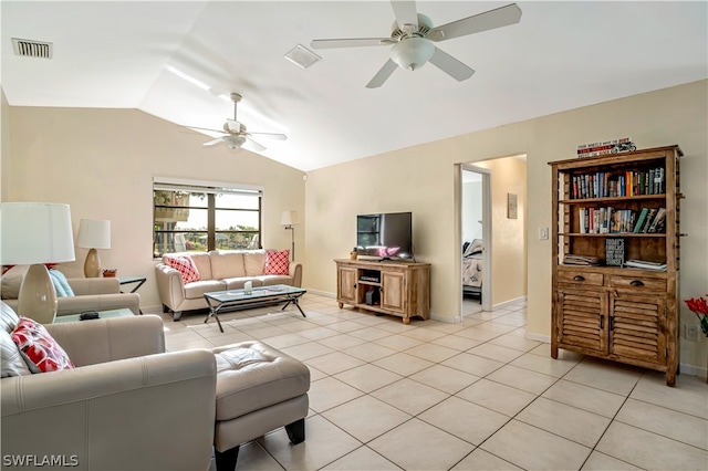 tiled living room with ceiling fan and vaulted ceiling