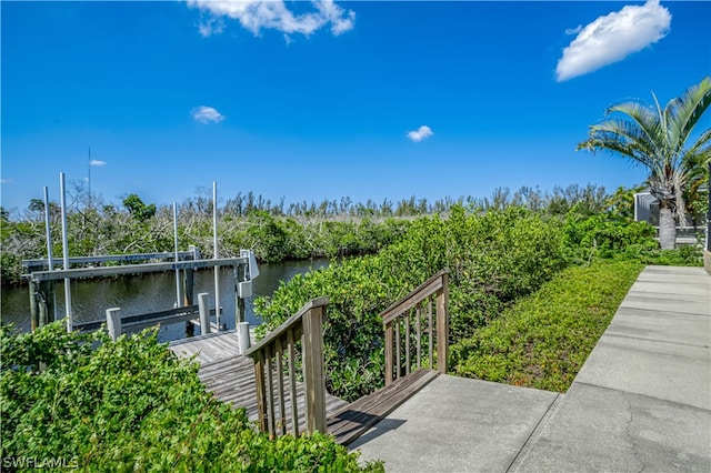 view of dock with a water view