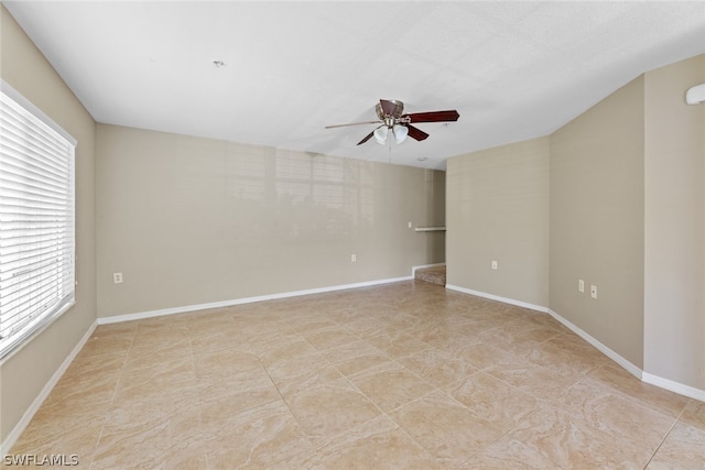 empty room with ceiling fan