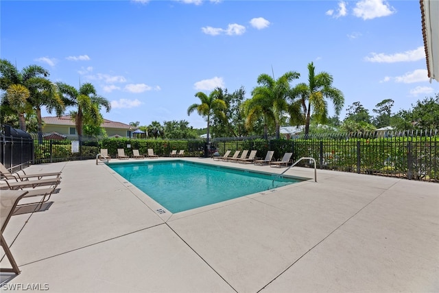 view of swimming pool featuring a patio