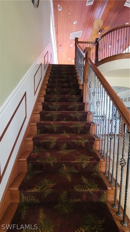 stairs featuring wood-type flooring