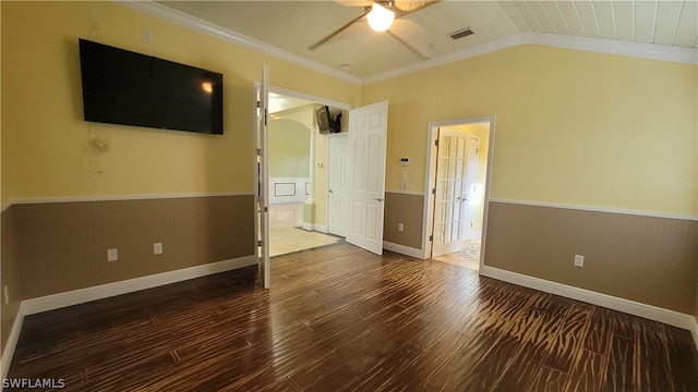 spare room with vaulted ceiling, crown molding, hardwood / wood-style floors, and ceiling fan